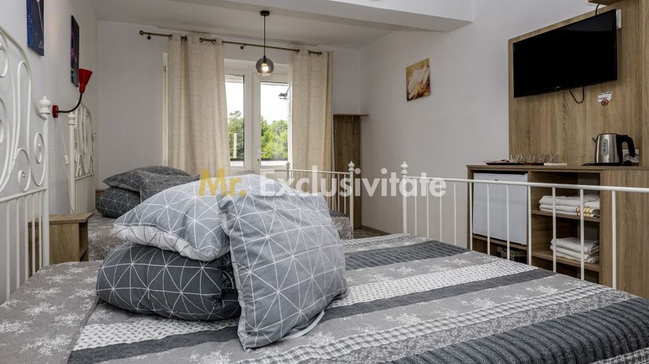 Motel, camping, piscina si lacuri de pescuit pe un teren de 49 285 mp - Poză 10