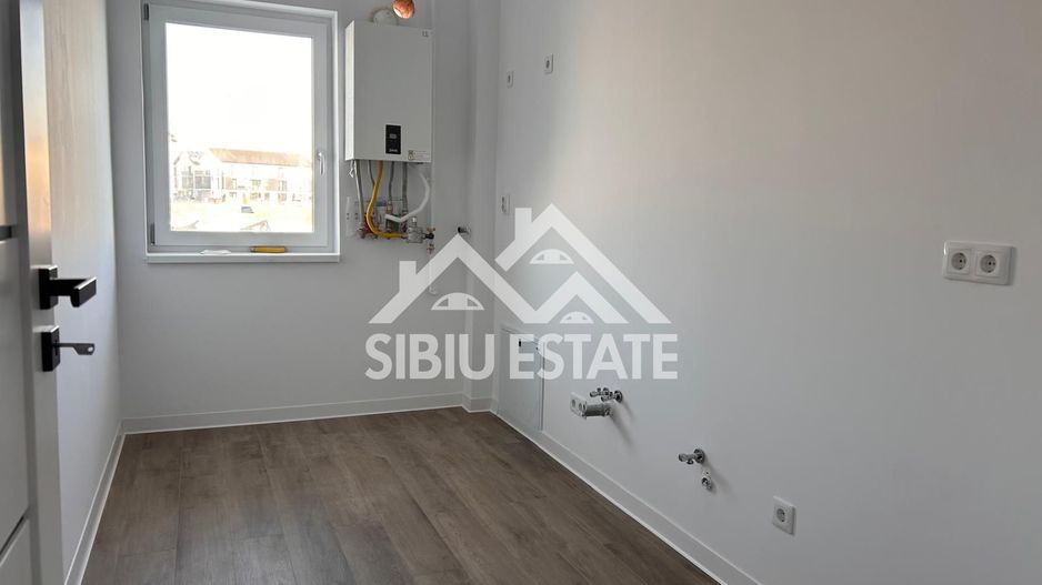 Garsoniera 41 mp, balcon bucatarie separata , intabulata zona Brana - Poză 19