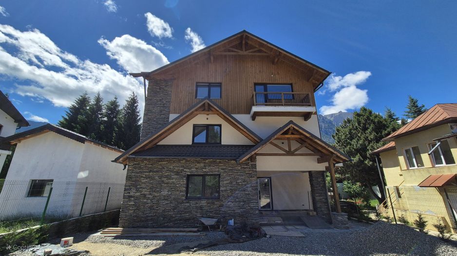 Apartament  cu 2 camere 49,35 mp + 21,35 mp terasele + loc de parcare - Busteni - Poză 1