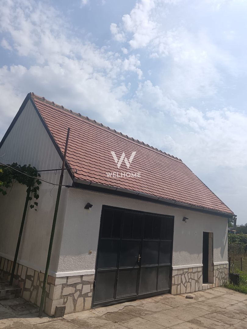 Casă individuală cu 2 apartamente separate, teren 650 mp, garaj și terasă - Poză 11