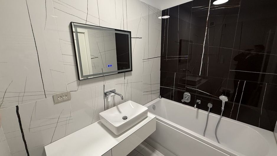 Închiriez apartament 2 camere modern, zona Unirii, centrală proprie - Poză 7