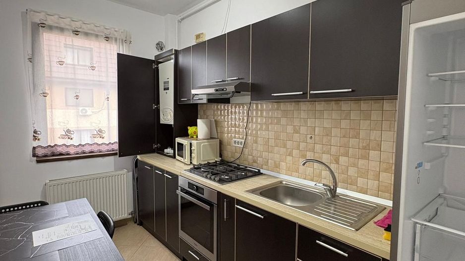 GARSONIERA - PARCARE INCLUSA, BUCATARIE INCHISA, CENTRALA PROPRIE - Poză 3