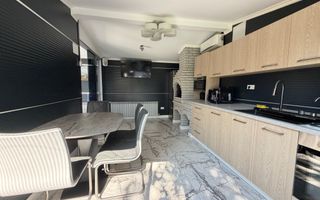 Casa P+1+M cu teren de 650 mp, piscina si curte complet amenajata - Poză 10