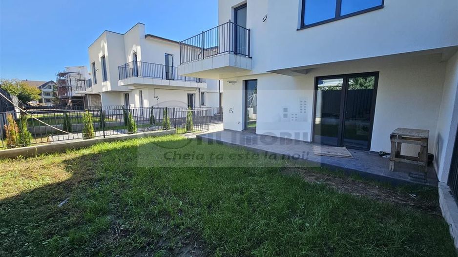 Apartament exclusivist dispus P+1E + curte 70mp - Poză 2