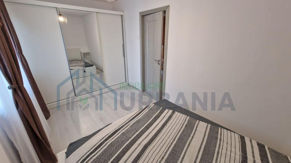 Apartament 2 camere de închiriat în Alexandru cel Bun, renovat integral și mobilat modern - Poză 12