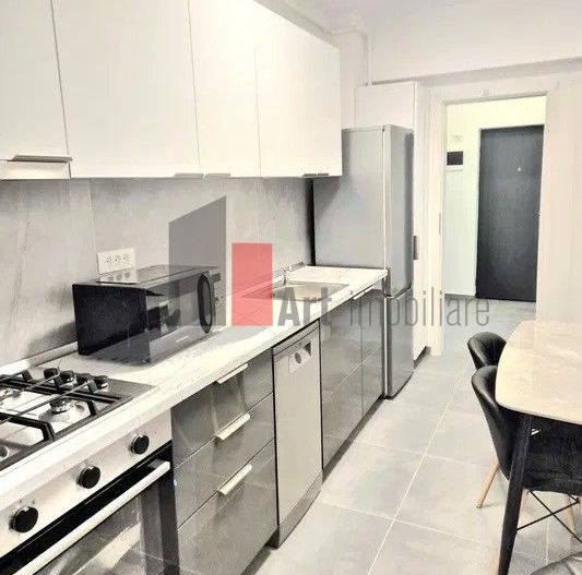 Apartament cu 2 camere de inchiriat-Aparatorii Patriei-cu centrala+loc parcare - Poză 7