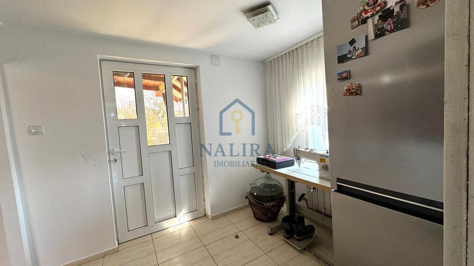 Casa de caramida de vanzare Surdesti cu teren intravilan 5000mp - Poză 5