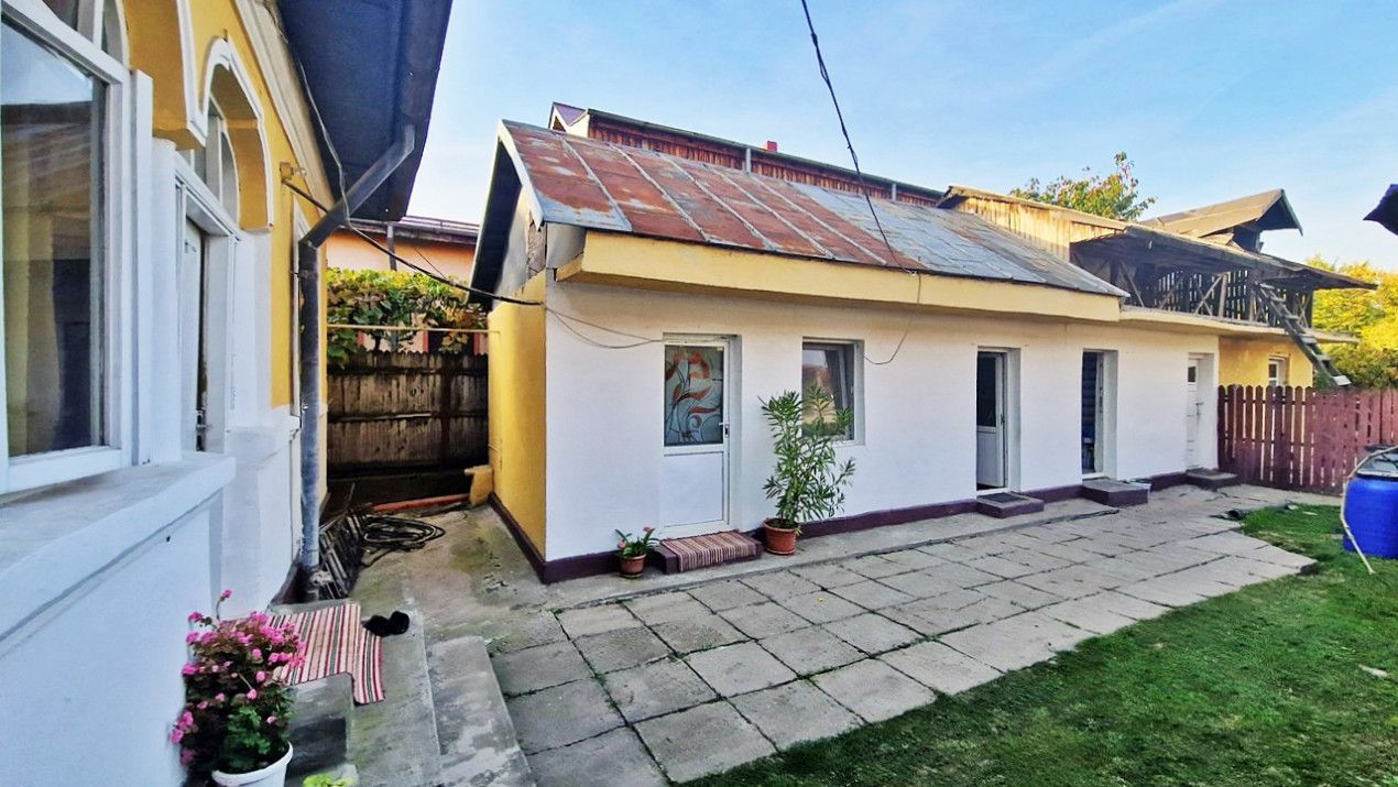 Vanzare casa cu teren 1800 mp, Pitesti str Bananai, la intrare - Poză 13