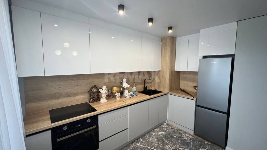Apartament  cu 1 Cameră + Living pe Bd. Dacia, Botanica - Poză 2