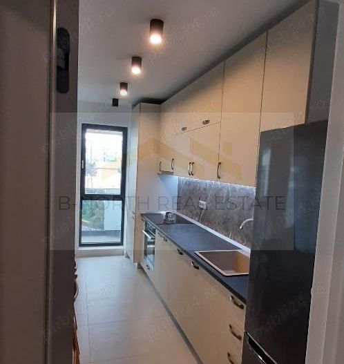 Apartament de închiriat 2 camere Nusco City Pipera | Vedere către grădina - Poză 4