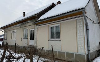 Casă cu teren generos în Buciumi - Poză 4