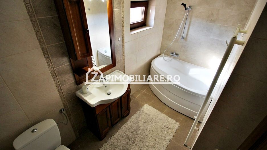 Casa 3 camere, 2 bai,1 garaj,teren 360 mp.zona Dambu Pietros - Poză 7