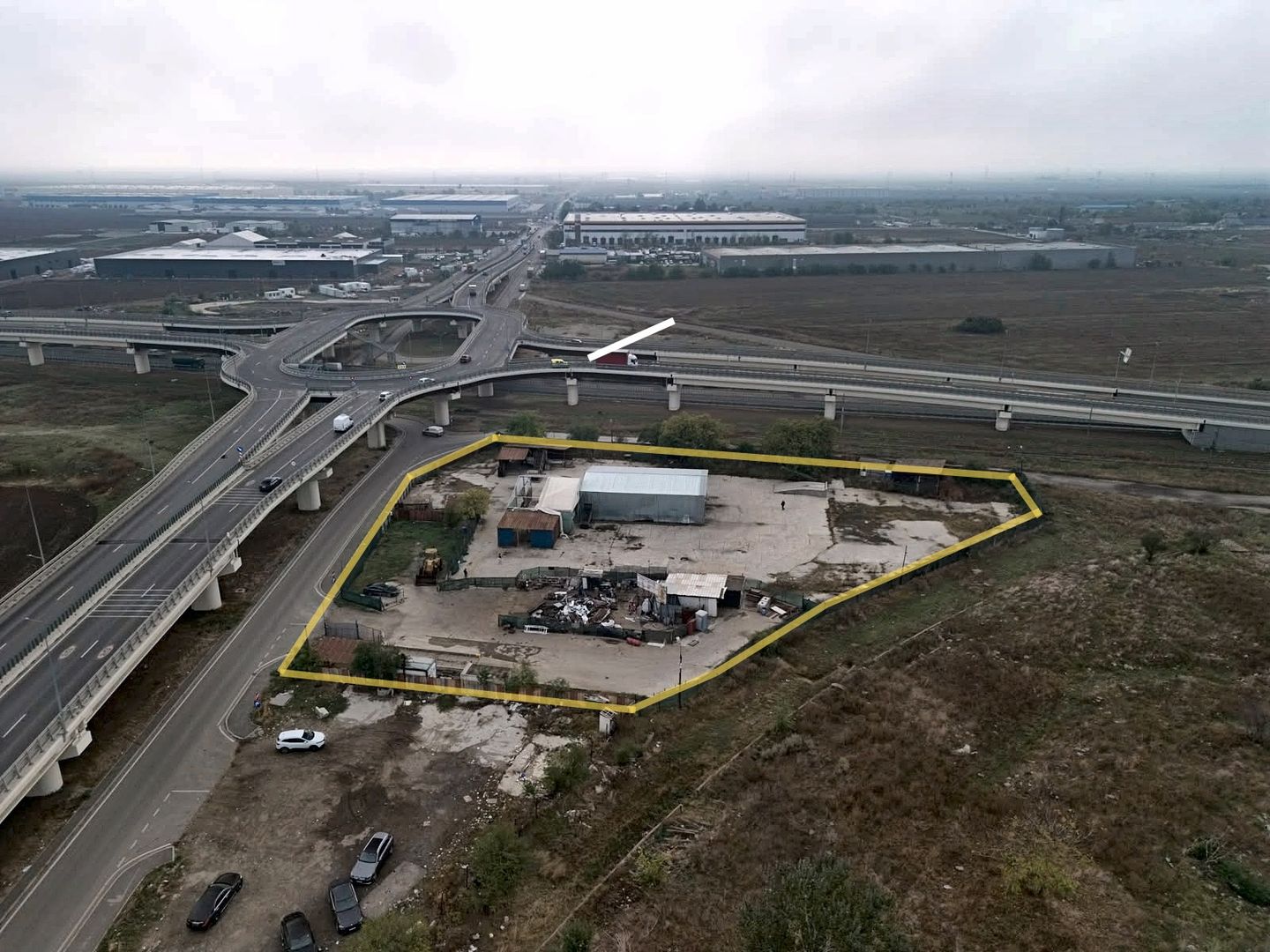 Teren intravilan de vanzare 7025 mp, potential industrial si comercial - Poză 1