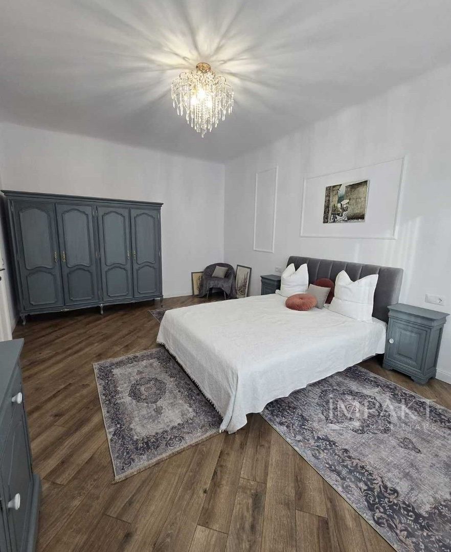 Apartament modern cu 3 camere si gradina aproape de centru - Poză 1
