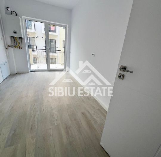 Studio 41 mp, balcon bucatarie separata , intabulata zona Brana - Poză 2
