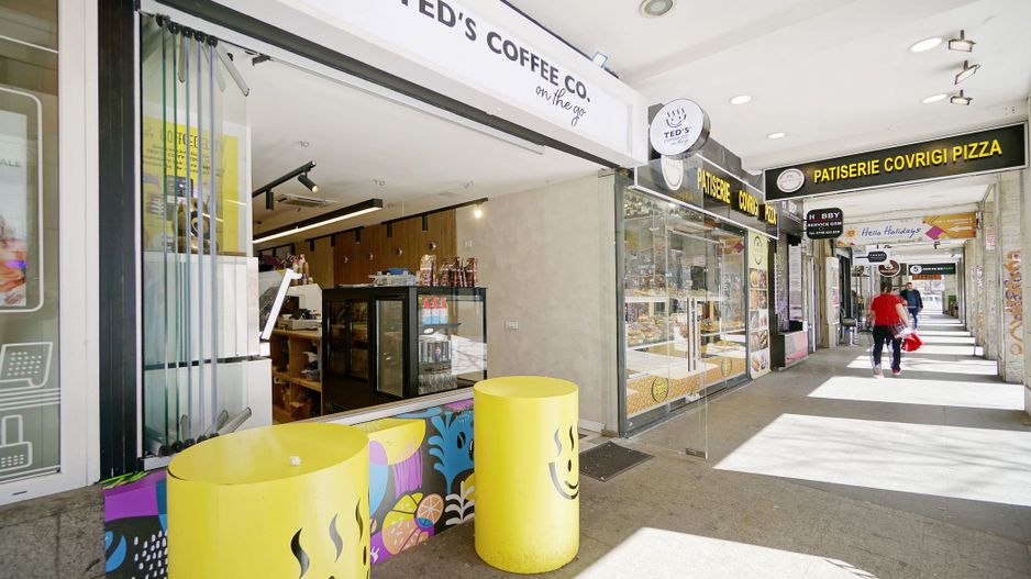 Spatiul comercial Piata Romana ,la coloane - Poză 3