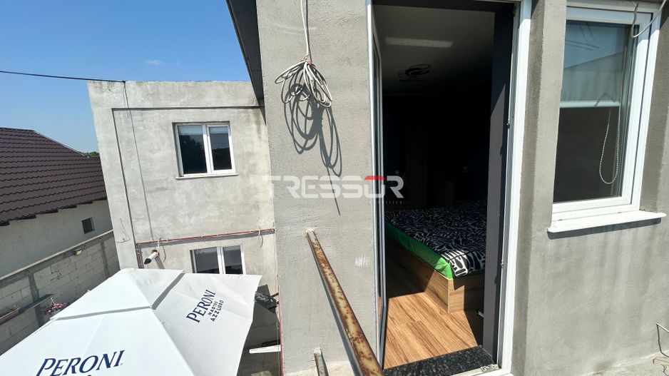 Casă P+1E cu terasă circulabilă, garaj amenajat și finisaje moderne - Poză 34