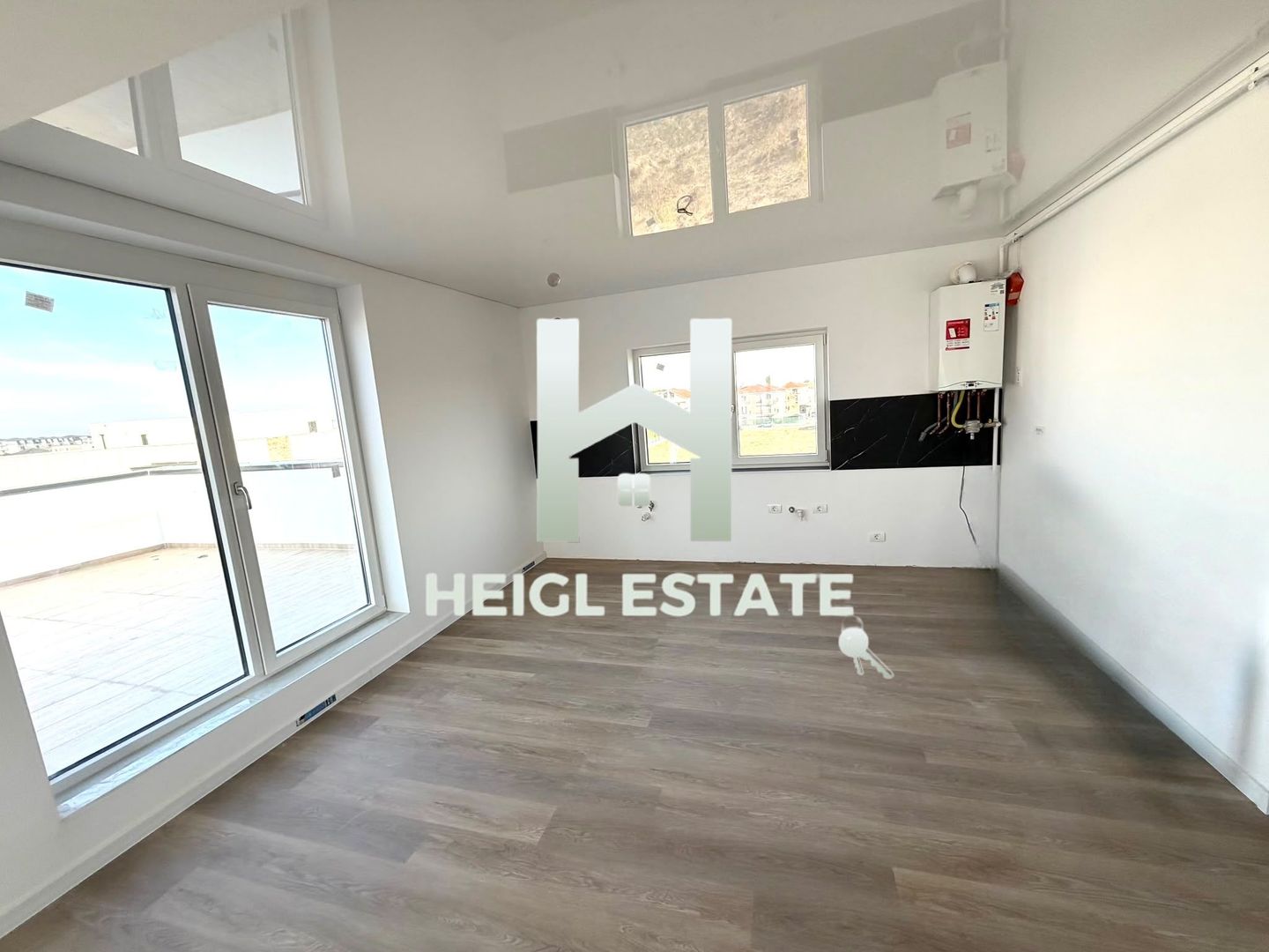Apartament de tip penthouse cu 45 mp terasa - Poză 3