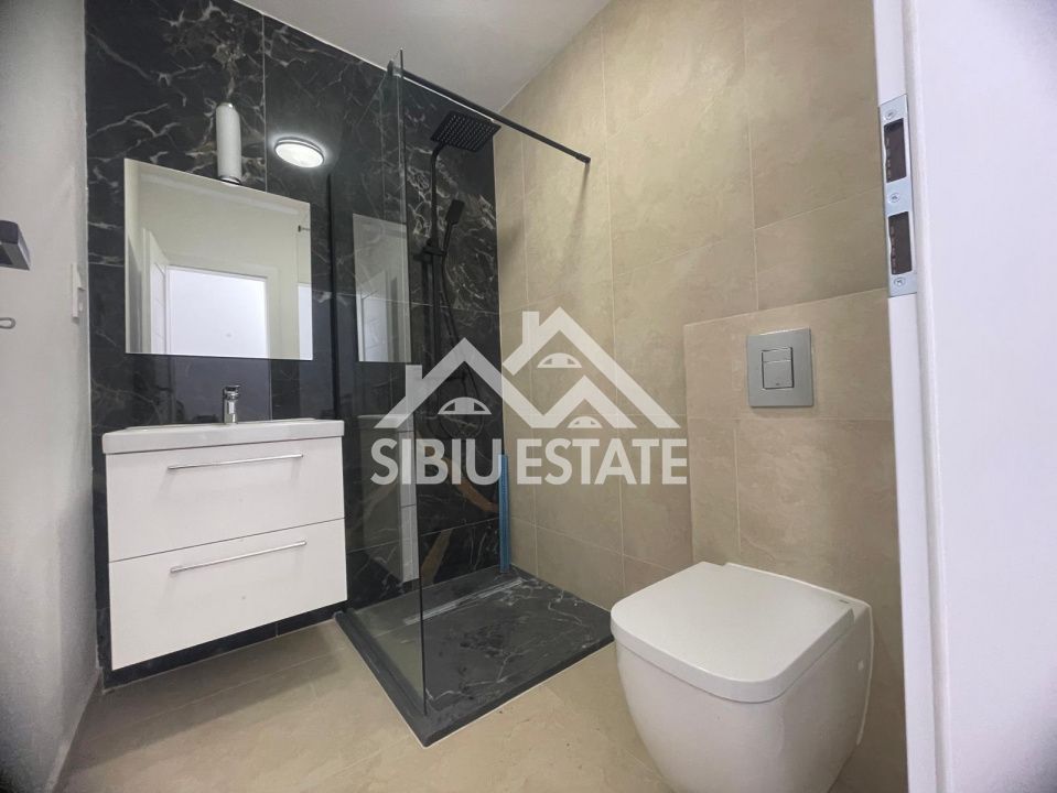 Apartament cu 3 camere, s.utila 70.15 mp.  bloc cu lift-  loc de parcare - Poză 13