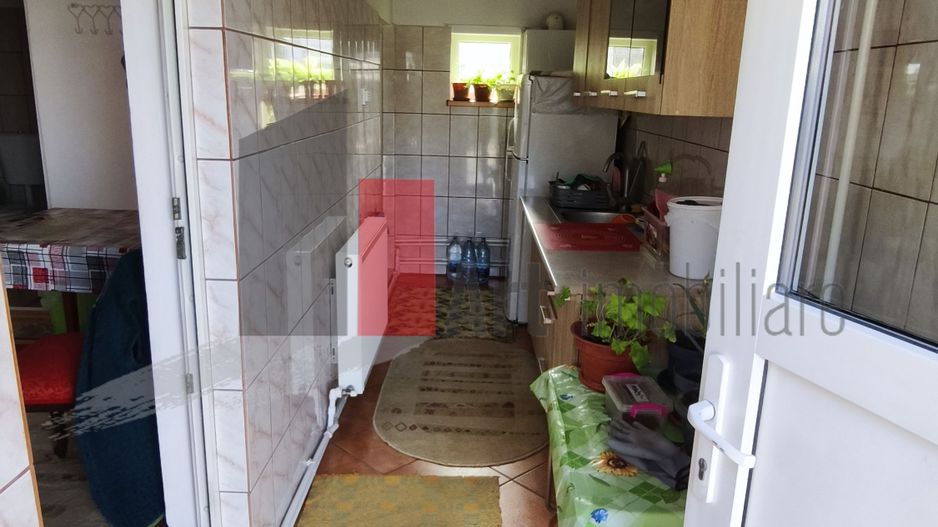 Casa curte cu teren 1600 mp Manolache - Poză 11