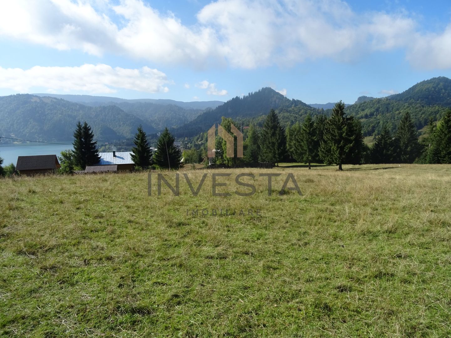 Oportunitate langa lacul Colibita! Teren intravilan 12.588 mp! - Poză 2