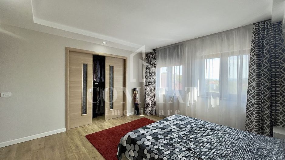 Casă cochetă cu teren generos și panoramă Chinteni - Poză 7