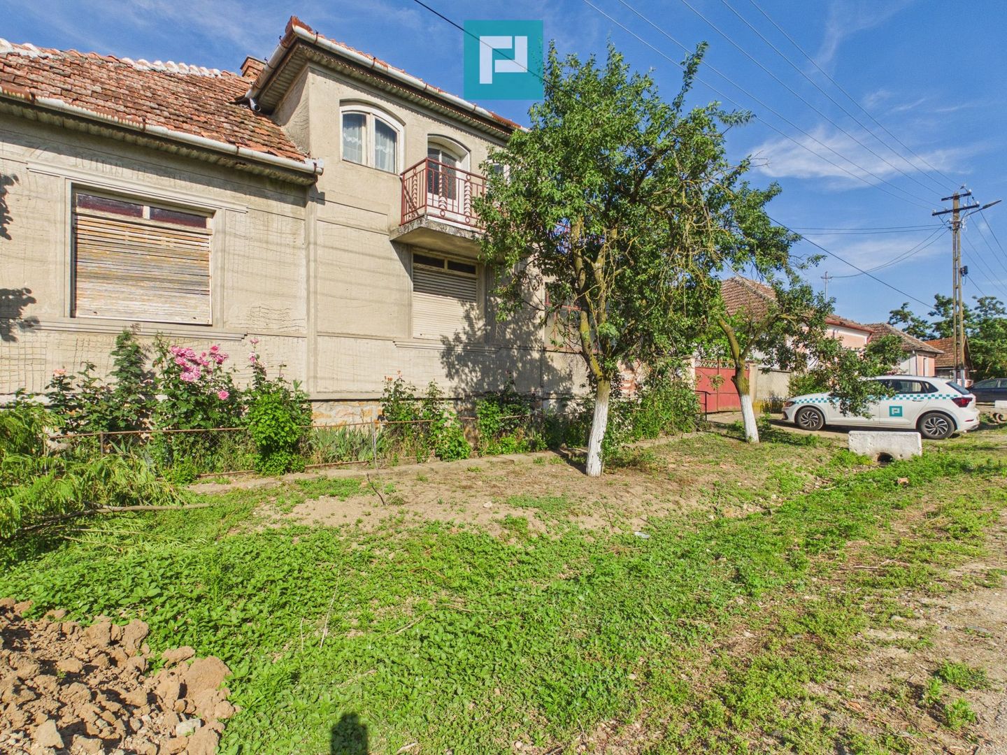 Casă cu 4 camere și teren de 2880 mp în Fiscut - Poză 1