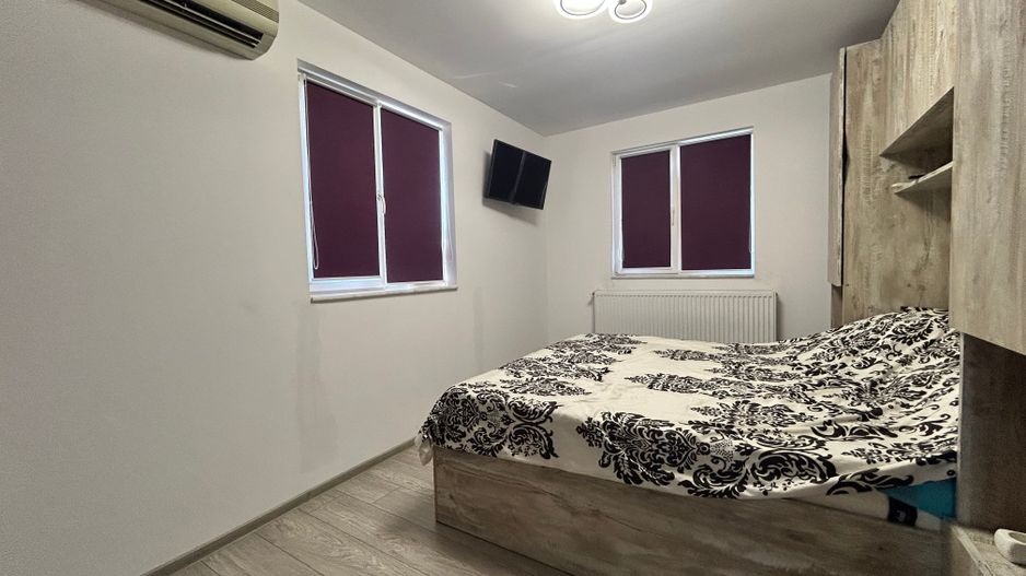 Casă P+1E cu terasă circulabilă, garaj amenajat și finisaje moderne - Poză 17