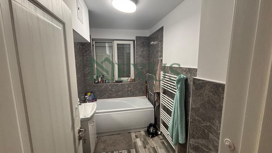 SPAȚIU COMERCIAL RENOVAT COMPLET ÎN MOINEȘTI - Poză 2