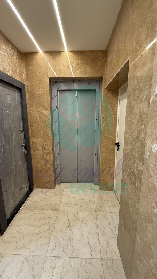 Apartament cu LIFT IN INTERIOR si doua terase de 21 mp in total - Poză 4