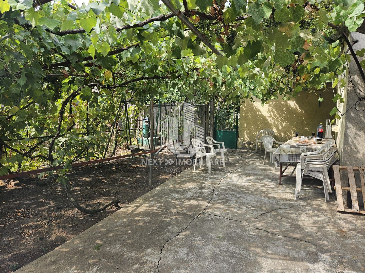 Casă  4 camere cu 2 intrări, garaj și teren 1751mp– Cobadin - Poză 4