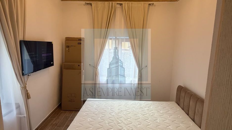 Garsonieră cochetă de închiriat în Schei - Poză 1