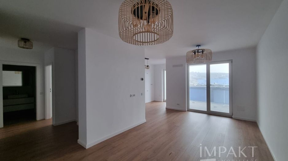 Vanzare apartament in bloc nou, etaj intermediar si terasa! - Poză 2