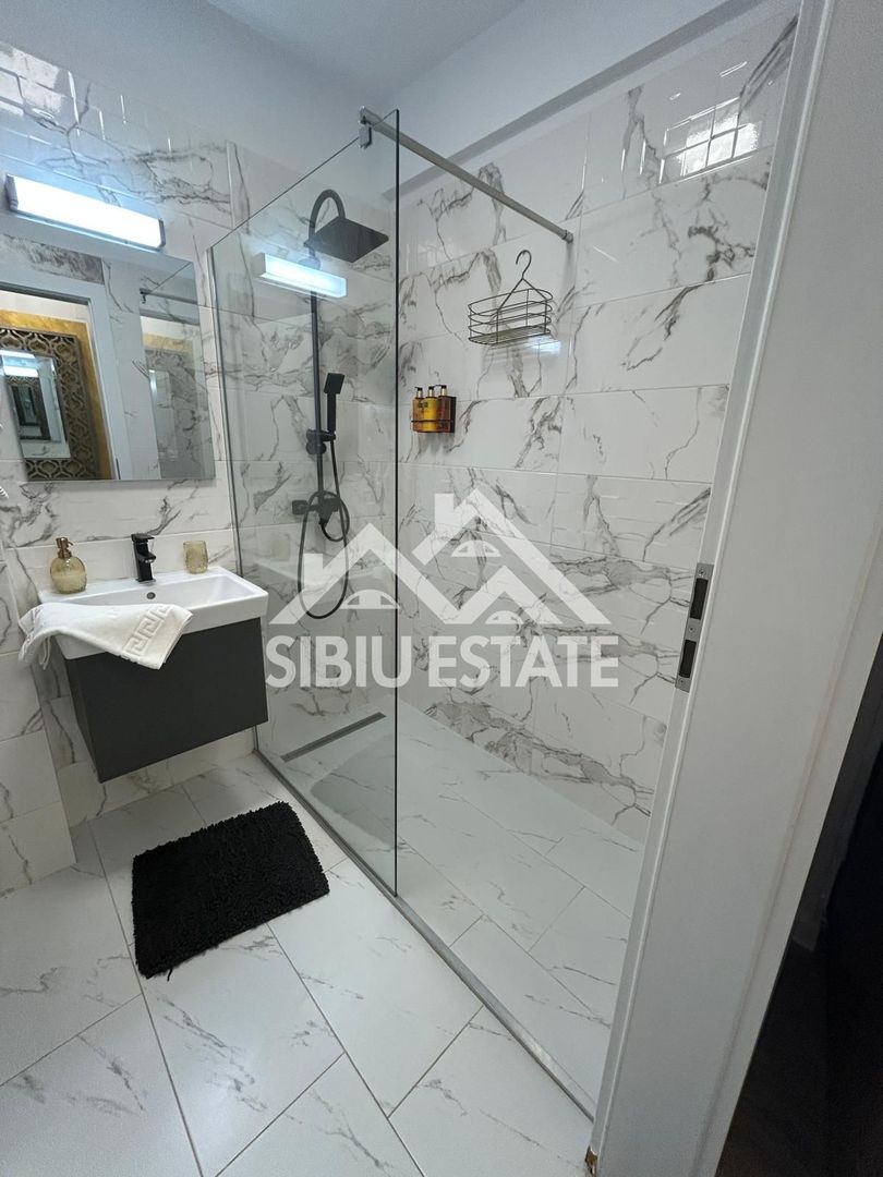 Apartament mobilat-utilat, cu 2 camere, balcon, parcare si boxa - Poză 3