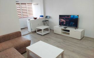Vanzare Garsonieră 33 mp, etaj 10/10, mobilată, parcare și 2 lifturi - Poză 1