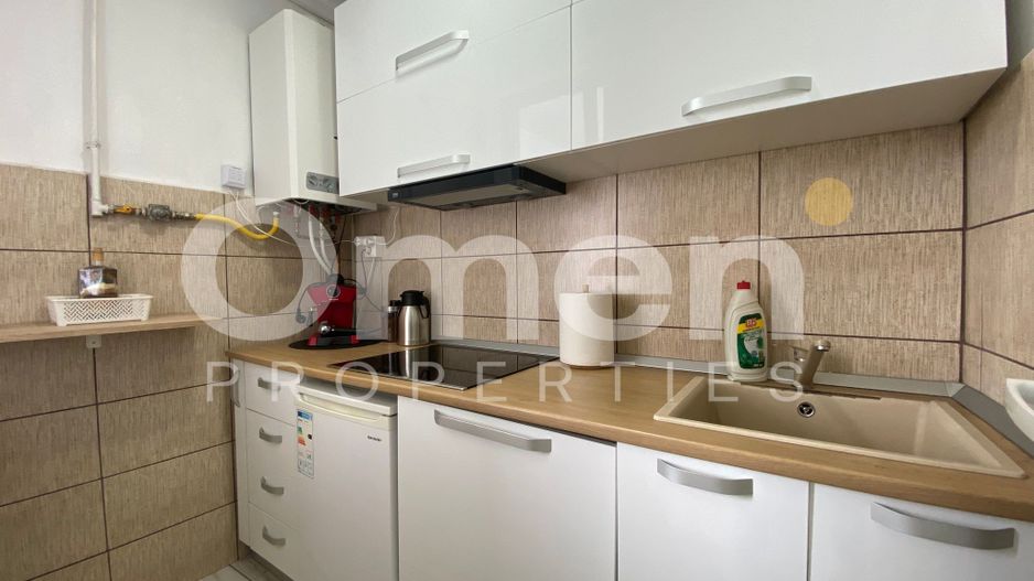 Garsoniera finisata modern, la etaj intermediar, cu priveliste panoramica - Poză 4