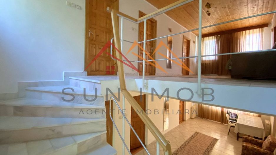 Vila de vanzare, teren 3100 mp, 7 camere, 6 grupuri sanitare, 3 CT, an 1997 - Poză 30