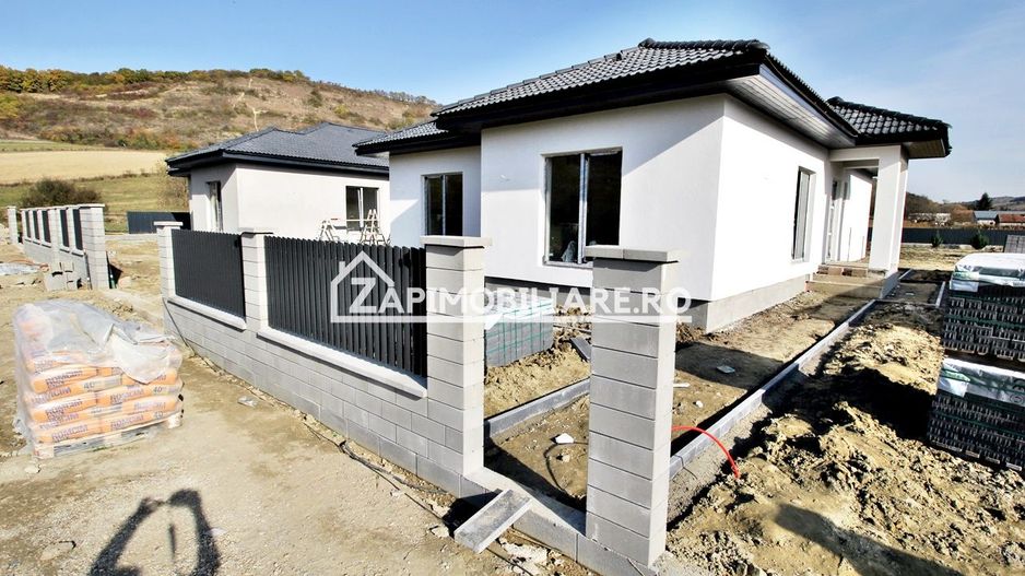 Casă la cheie pe 1 nivel 4cam. 2 bai,1 dresing 650 mp. teren - Poză 29