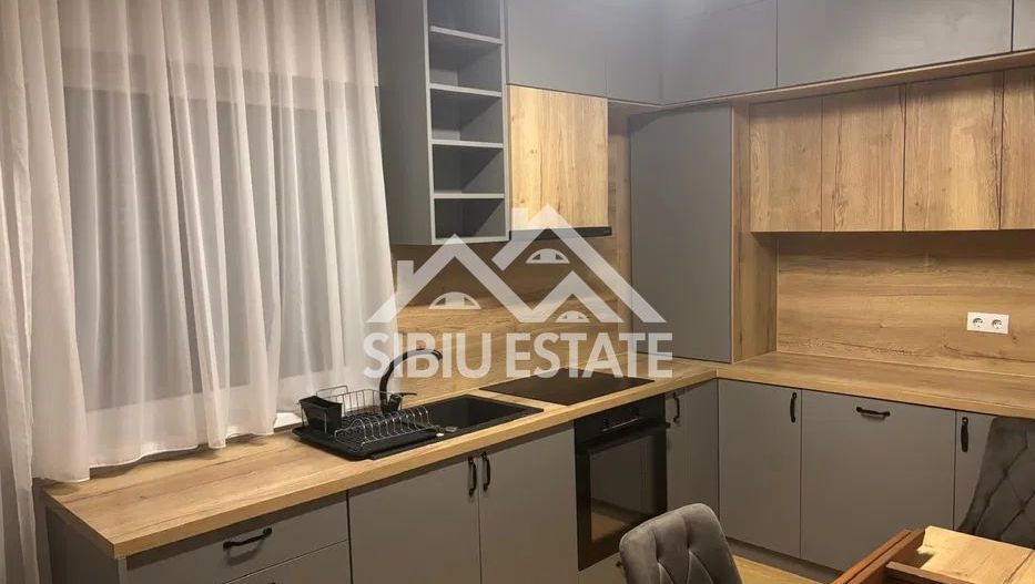 Apartament de inchiriat cu 2 camere, mobilat utilat, parcare subterana - Poză 2