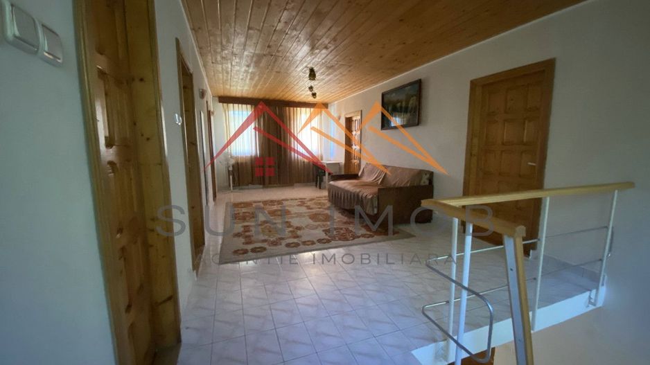 Vila de vanzare, teren 3100 mp, 7 camere, 6 grupuri sanitare, 3 CT, an 1997 - Poză 31