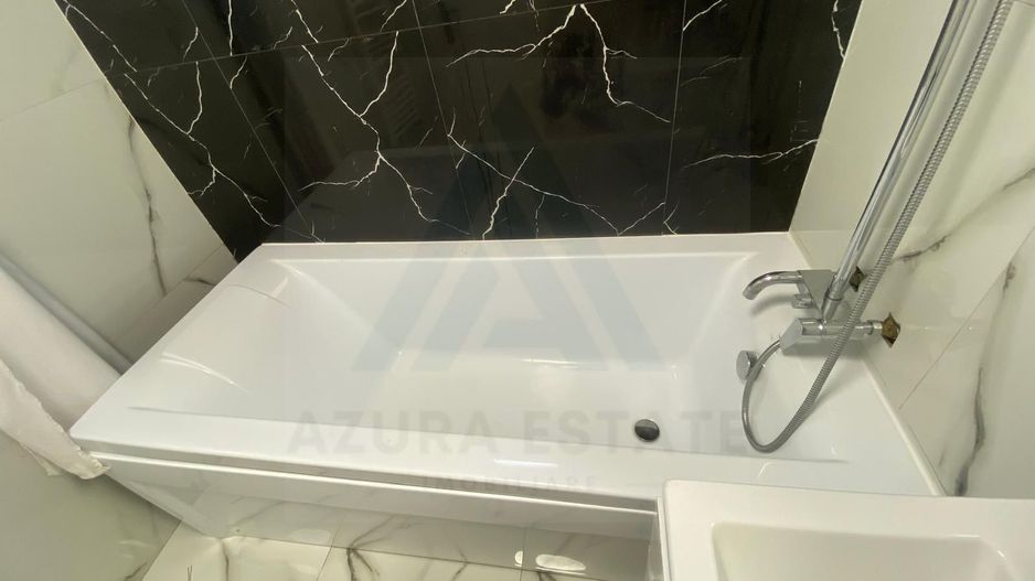 Casa renovata 250 mp utili si teren 935 mp in zona centrala Cisnadie - Poză 6