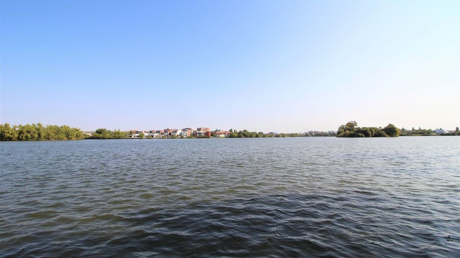 Teren 5963 mp deschidere lac Grivita 42 m cu deschidere la strazi 77 m - Poză 7