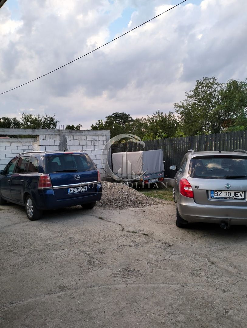 Casa si teren 970mp in comuna Costesti/BZ ~ constructie 2013 - Poză 36