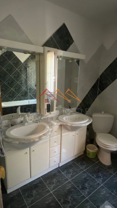 Vila de vanzare, teren 3100 mp, 7 camere, 6 grupuri sanitare, 3 CT, an 1997 - Poză 50