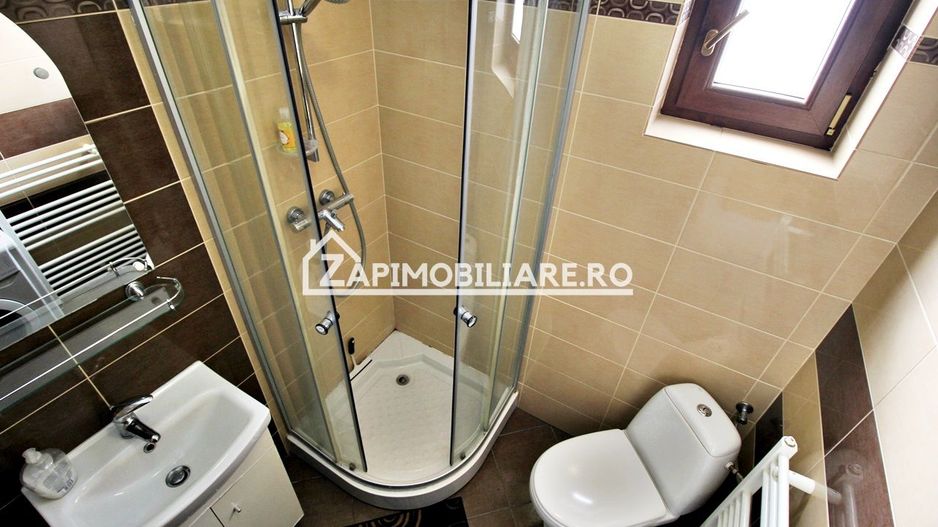 Casa 3 camere, 2 bai,1 garaj,teren 360 mp.zona Dambu Pietros - Poză 11