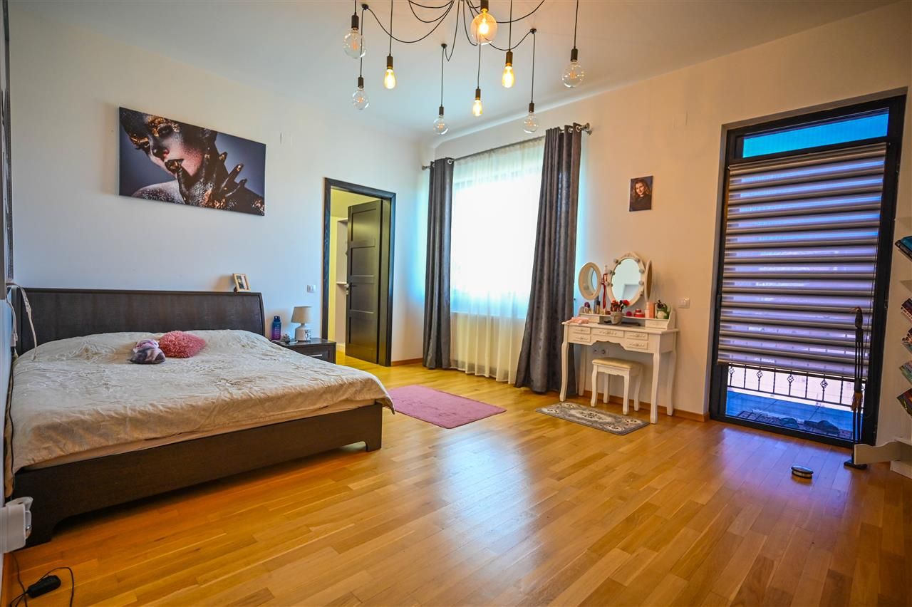 Somptuozitate in stil modern, 2 garaje, 3 terase, totul pe 1.000 mp teren - Poză 10