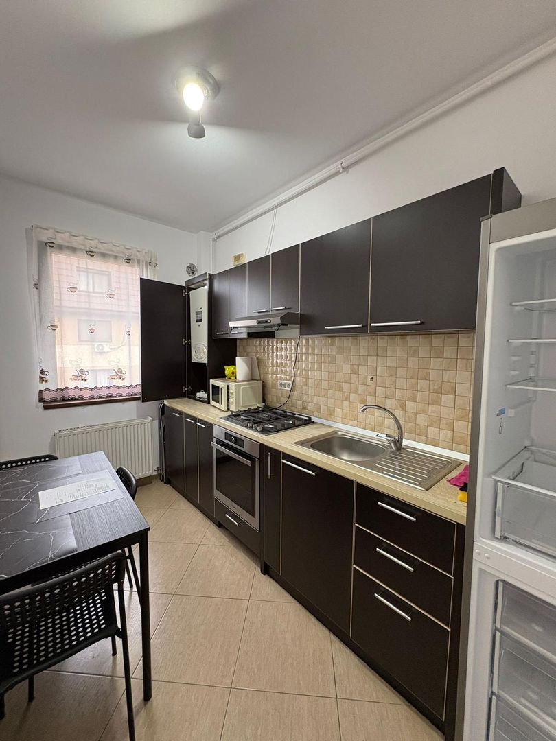 GARSONIERA - PARCARE INCLUSA, BUCATARIE INCHISA, CENTRALA PROPRIE - Poză 3