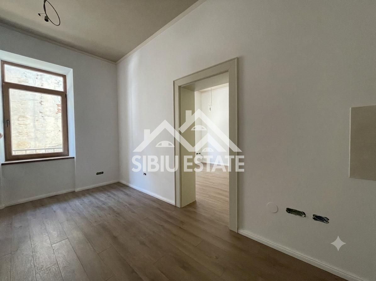 Apartament renovat, în inima Sibiului, pe strada Nicolae Bălcescu - Poză 6