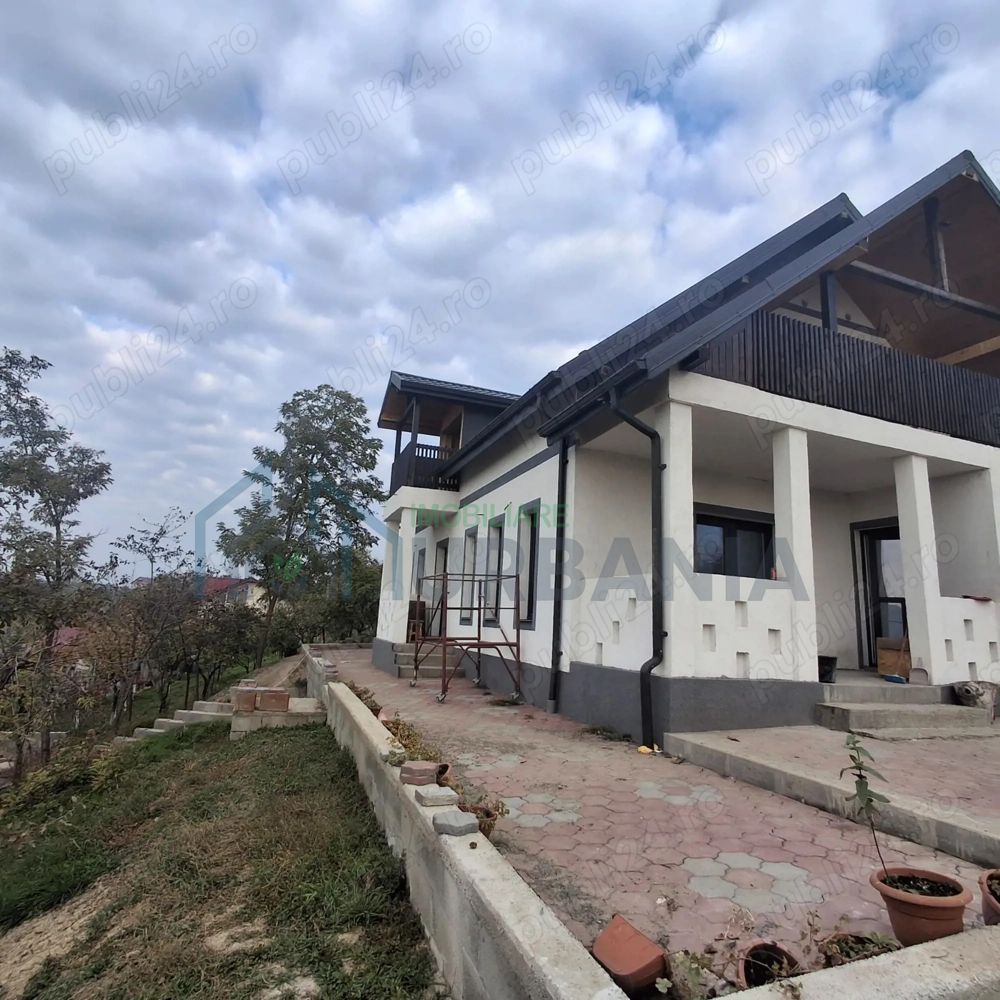 Vând casă P+M (2020) cu teren 2.860 m, Țigănași stradă principală - Poză 1