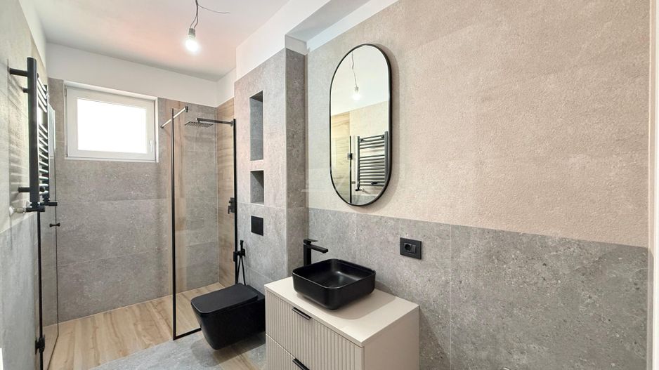 Ap pe 2 niveluri. Bucatarie inchisa, 2 bai. 2 locuri de parcare. - Poză 3